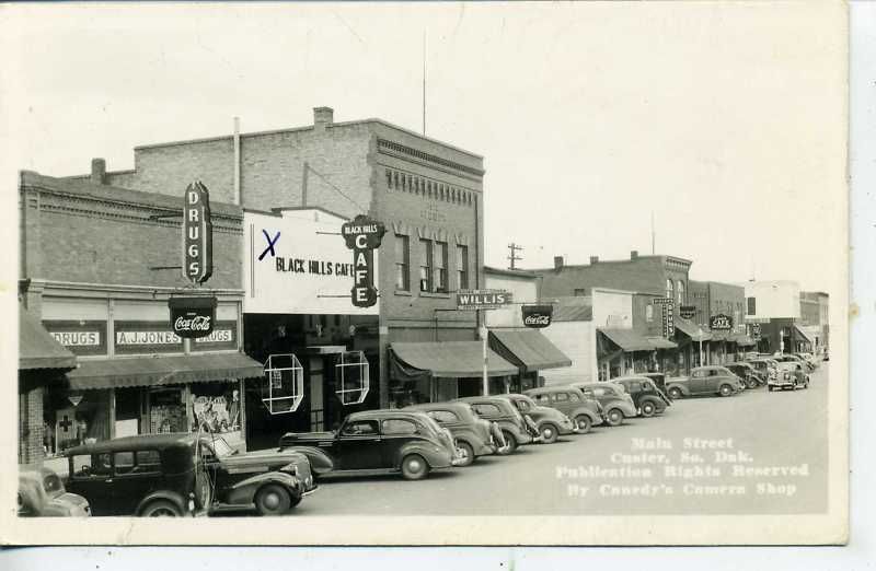 RPPC CUSTER SOUTH DAKOTA 1940s CARS DOWNTOWN POSTCARD  