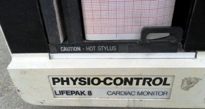   Lifepak 8 fisios de control con la impresora y las paletas usadas