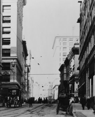 1800s photo Street view with horse drawn carriages  