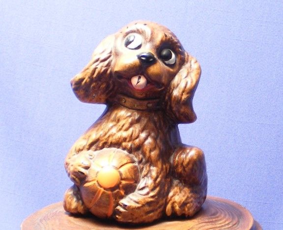 PUPPY ON A TREE STUMP COOKIE JAR WITH NUMBER IN LID.  